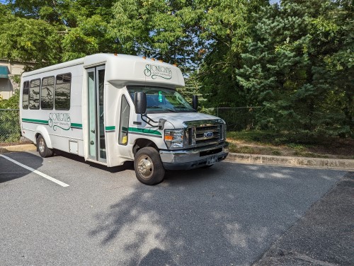 Parastransit van sitting in a parking lot needs insurance